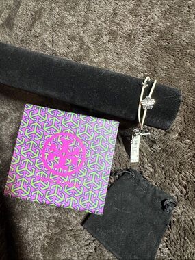 Tory Burch Cream Leather Bracelet with Silver Floral Charm